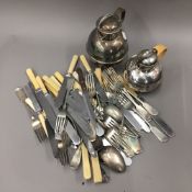 A quantity of silver plated flatware, together with two plated Guernsey milk jugs, etc.