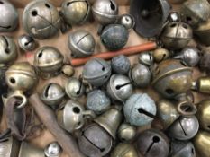 A box of Victorian and earlier crotal bells