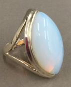 A silver and opaline ring