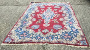 A Persian style wool carpet