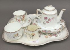 A Victorian porcelain tea for one set