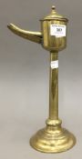 An 18th/19th century brass whale oil lamp