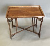 A Chinese hardwood folding occasional table
