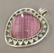 A silver pink heart pendant