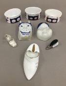 Two 19th century Japanese porcelain masks, miniature shoes, etc.