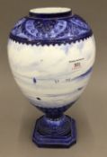 A Royal Crown Derby blue and white hand painted vase