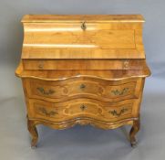 A Continental walnut bureau by Gobel