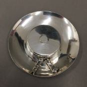 A hallmarked silver pin dish in the form of a wide brimmed hat with applied ribbon,