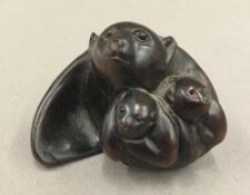 A Japanese carved wooden netsuke