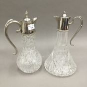 Two silver plate mounted claret jugs