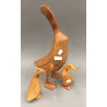 Three Dcuk Company wooden ducks