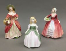 Two Doulton ladies and another