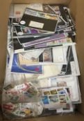 A large quantity of stamps, tea cards, etc.