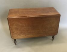 A Victorian mahogany drop leaf table