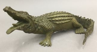 A brass model of a crocodile