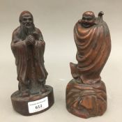 Two Chinese carved wooden figures