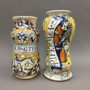 Two polychrome decorated Majolica drug jars