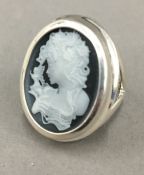 A silver cameo ring