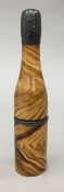 A novelty treen pipe and cigarette holder in the shape of a wine bottle,