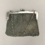 A silver mesh purse