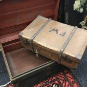 A painted tin trunk, together with a quantity of vintage cases, a vintage dolly and an easel, etc.