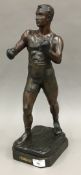 A late 19th/early 20th century patinated spelter model of a boxer,