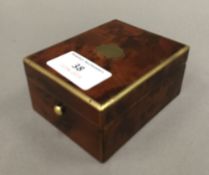 A small brass mounted amboyna box