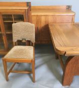 E GONNE, G-Plan, an Art Deco oak dining room suite, comprising: a drawer leaf dining table,