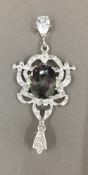 A silver and cubic zirconia pendant