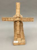 A windmill model formed from matchsticks