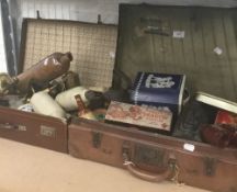 Two cases of miscellaneous items, including tins, bygones, etc.