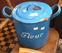 A vintage blue enamel flour bin