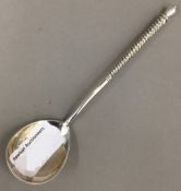 A Russian silver spoon,