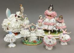 A quantity of Continental porcelain figural groups