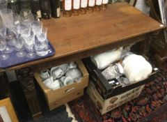 An 18th century and later carved oak side table