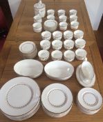 A Royal Worcester bone china Summer Morning pattern dinner service and tea service comprising: