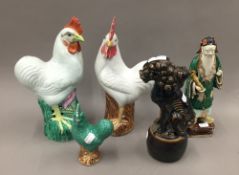 Five pieces of antique Chinese porcelain; three cockerels,