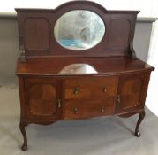 An early 20th century mahogany sideboard