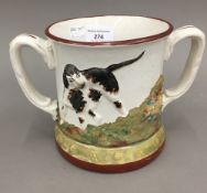 A 19th century Staffordshire pottery frog mug