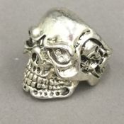 A silver skull ring