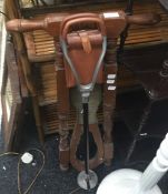 A vintage boot pull and a shooting stick