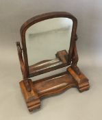 A Victorian mahogany toilet mirror