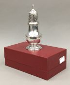 A silver sugar castor,