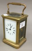 A brass cased carriage clock