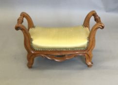 A 19th century upholstered foot stool