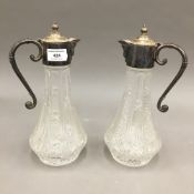 Two silver plate mounted claret jugs