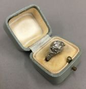 An 18 K white gold diamond ring (2.