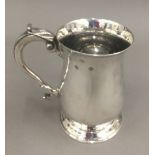 A silver tankard