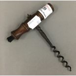 A 19th century treen handled corkscrew