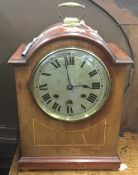 An Edwardian mahogany mantle clock